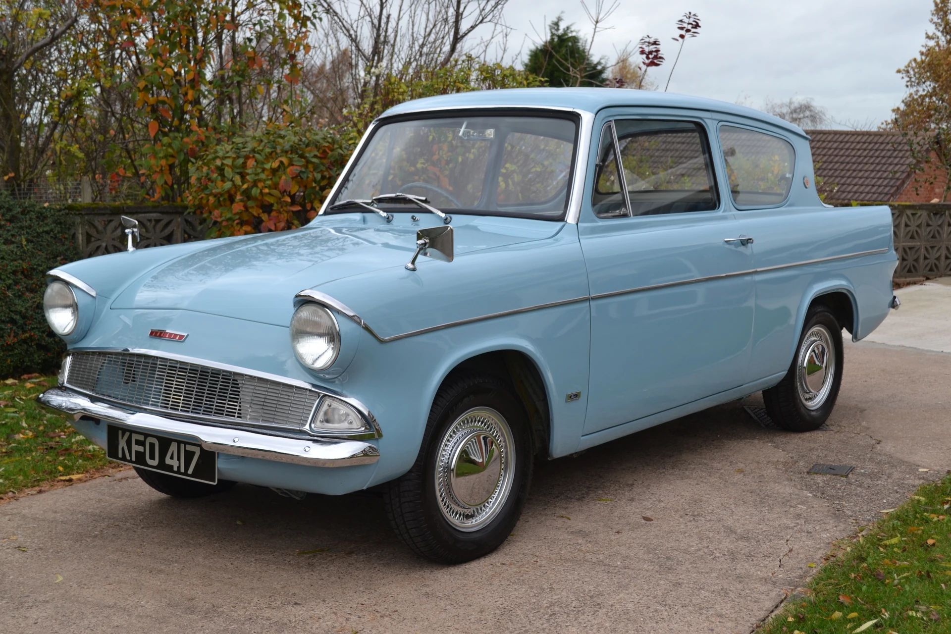 How Aerodynamic Were Old Cars? Here's Actual Wind Tunnel Data On Some 1960 Models. 7 Left front 3q view of a blue RHD 1960 Ford Anglia two-door sedan