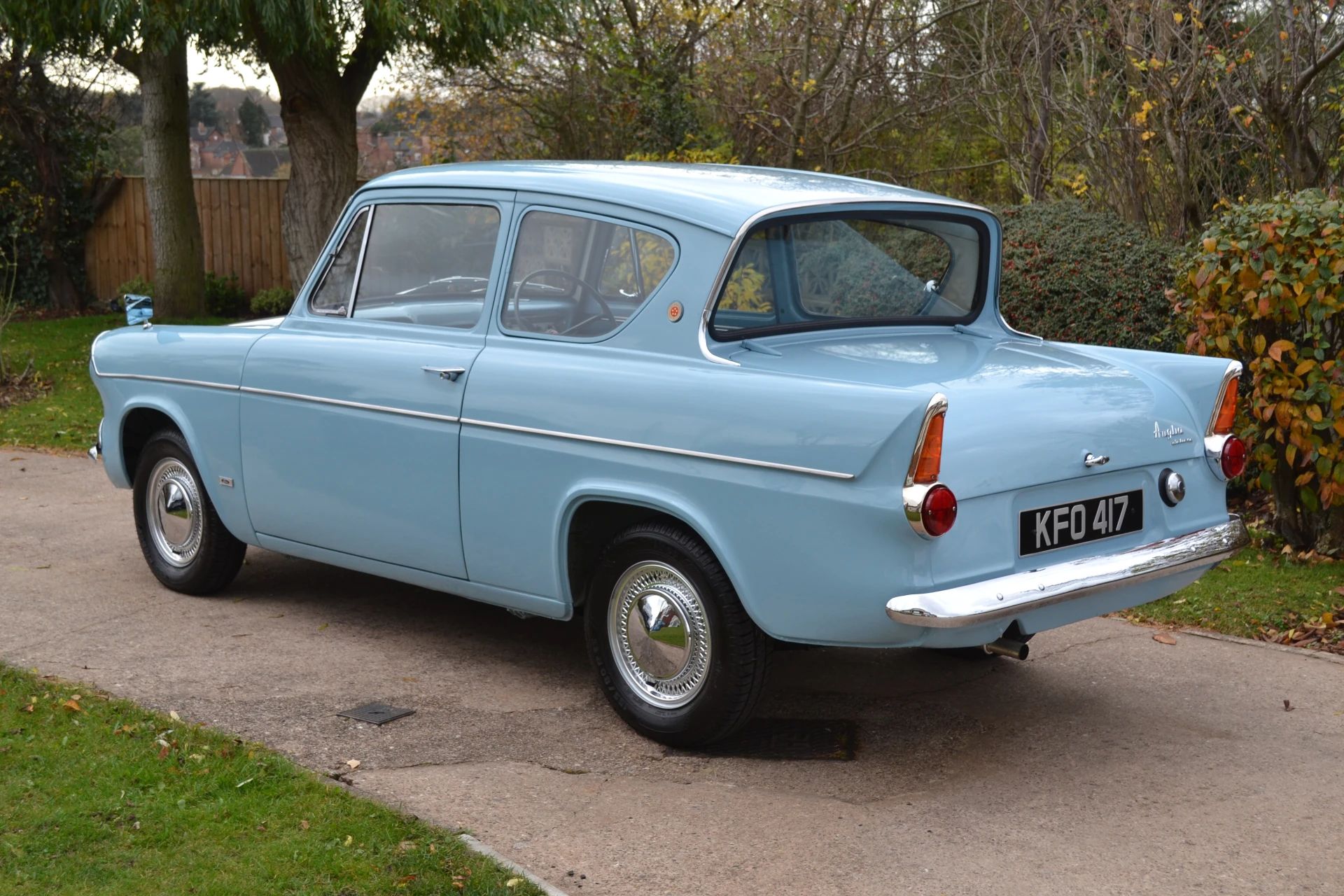 How Aerodynamic Were Old Cars? Here's Actual Wind Tunnel Data On Some 1960 Models. 8 Left rear 3q view of a blue 1960 Ford Anglia 105E, showing its recessed backlight and reverse-slant C-pillars