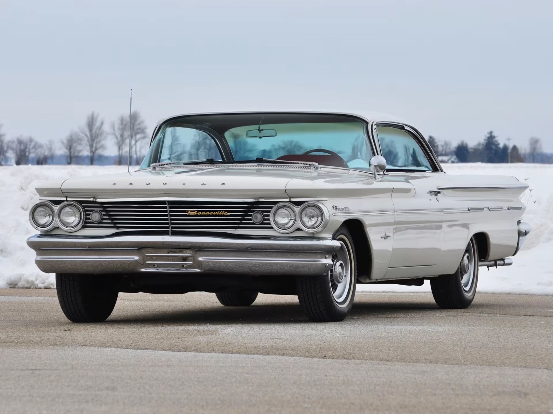 Left front 3q view of a white 1960 Pontiac Bonneville two-door "bubbletop" hardtop