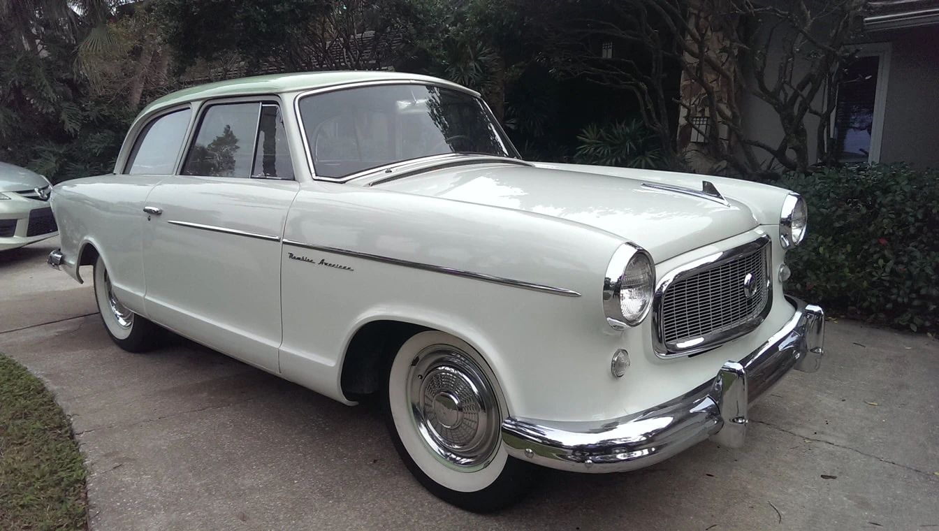 How Aerodynamic Were Old Cars? Here's Actual Wind Tunnel Data On Some 1960 Models. 19 Right front 3q view of a Frost White 1960 Rambler American two-door sedan with a Chatsworth Green roof