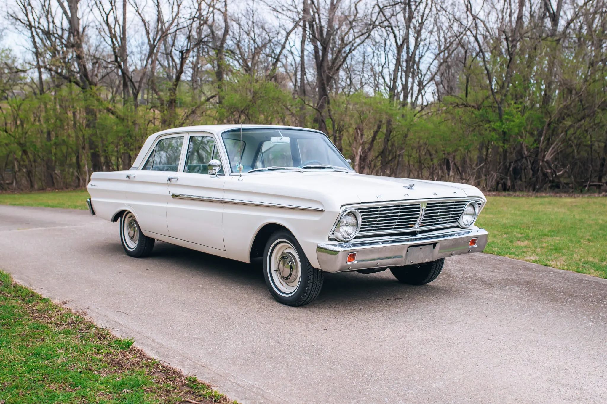 Right front 3q view of a white 1965 Ford Falcon sedan