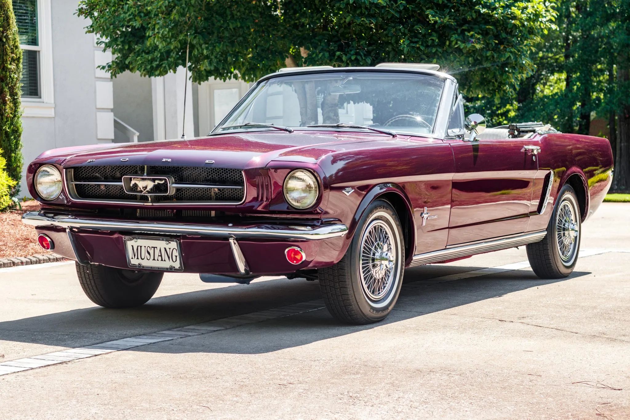 CC Tech: How the Mustang, Cougar, And Maverick Differed From The Original Ford Falcon Platform 11 Left front 3q view of a burgundy 1965 Ford Mustang convertible