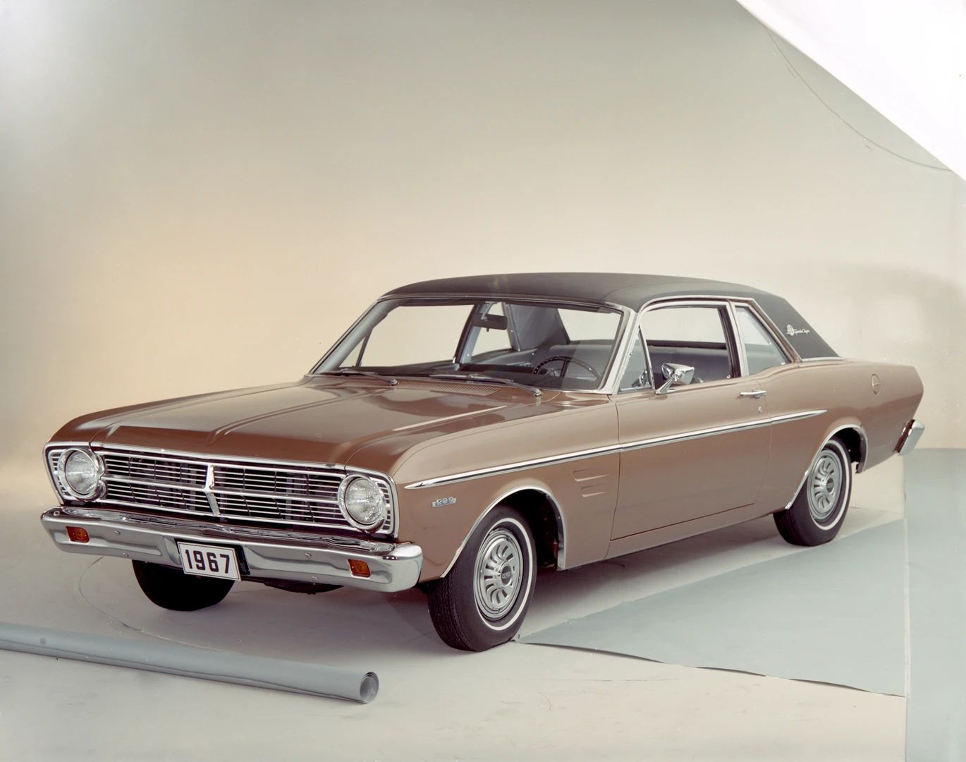 1967 Ford Falcon Sedans: Deeply Un-Hip Survivors That Have Somehow Beaten The Odds 9 Press photo of a brown 1967 Ford Falcon sports coupe with a vinyl roof