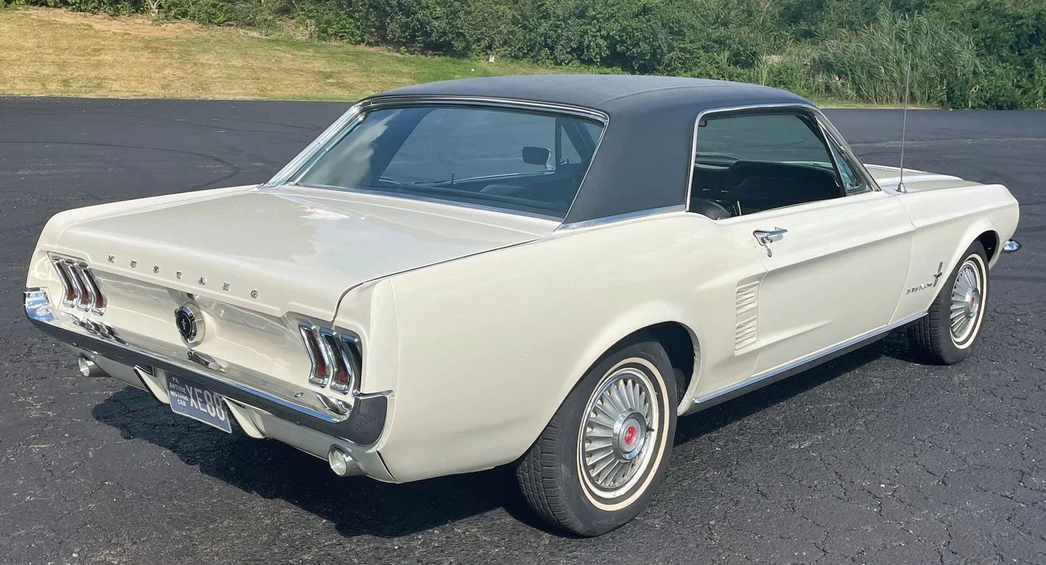 Rear 3q view of a white 1967 Ford Mustang hardtop