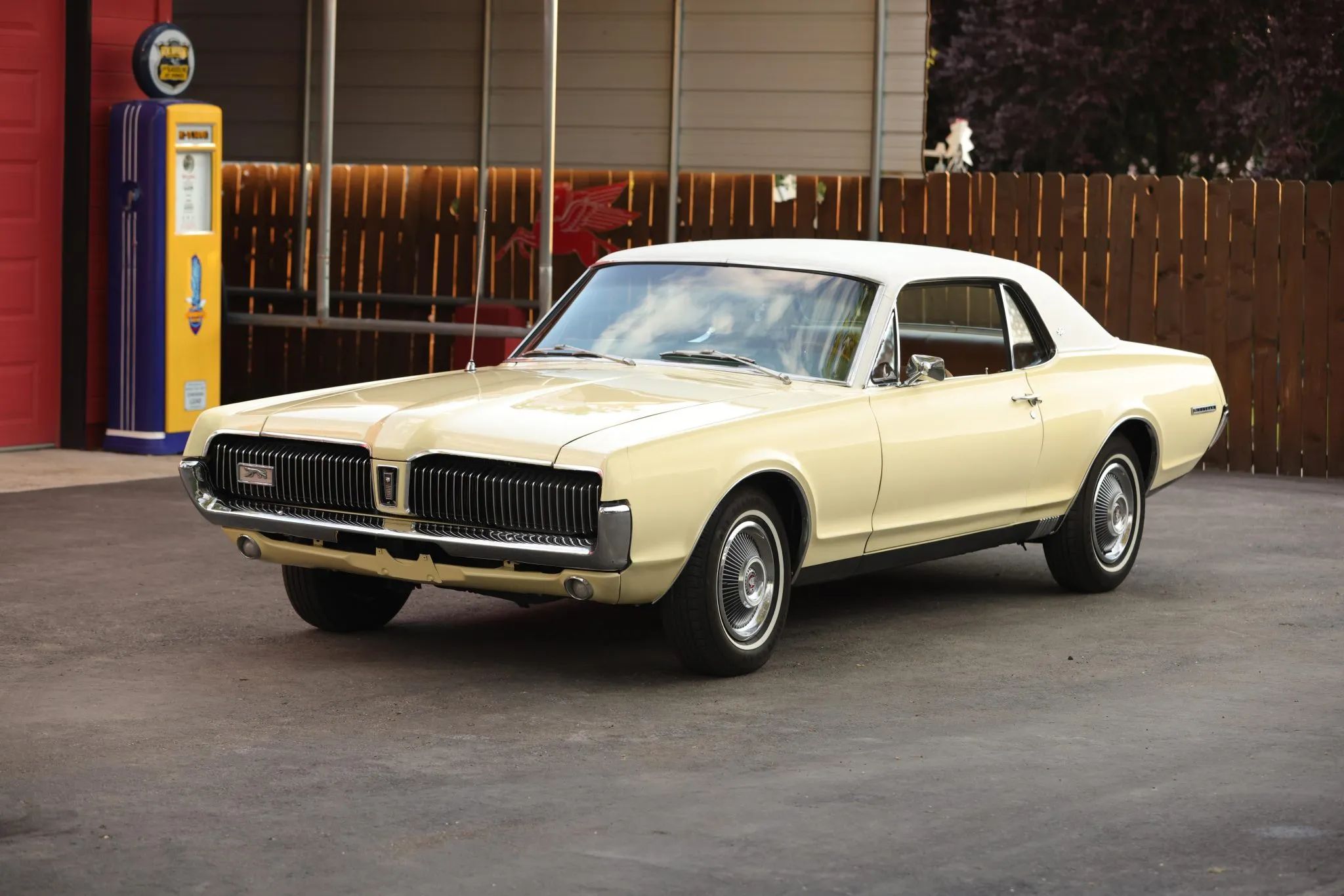 CC Tech: How the Mustang, Cougar, And Maverick Differed From The Original Ford Falcon Platform 23 Left front 3q view of a yellow 1967 Mercury Cougar XR-7 with a white vinyl top