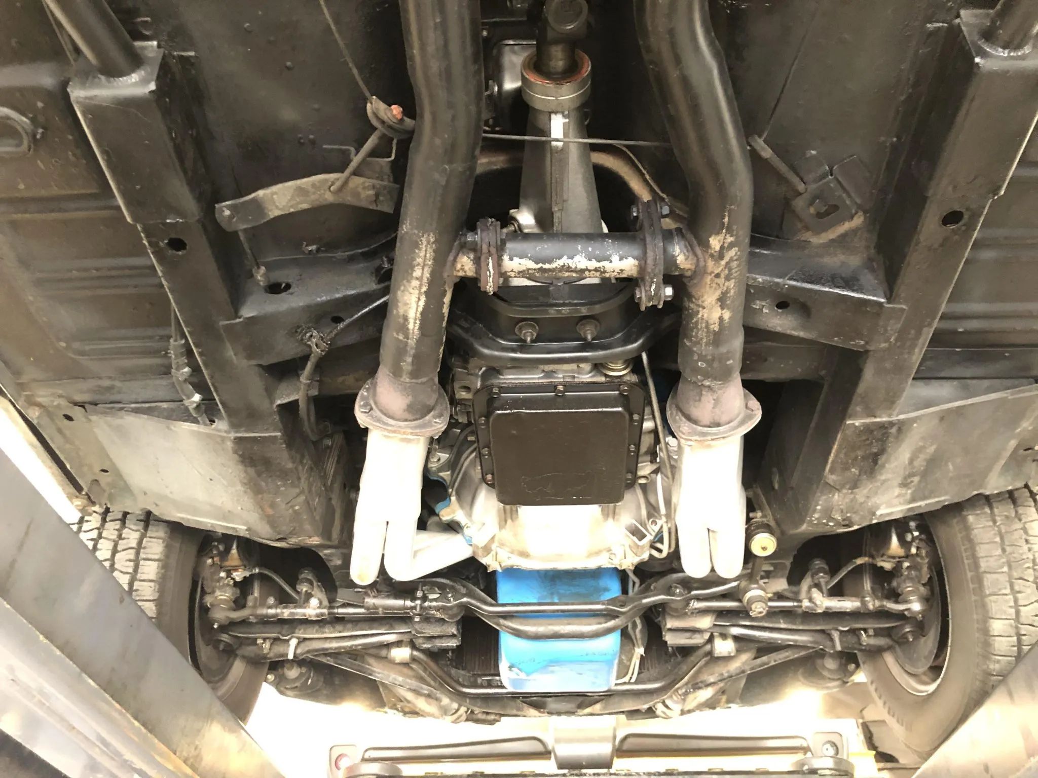 CC Tech: How the Mustang, Cougar, And Maverick Differed From The Original Ford Falcon Platform 22 Underside of a 1968 Ford Mustang fastback, showing the exhaust pipes and front torque boxes