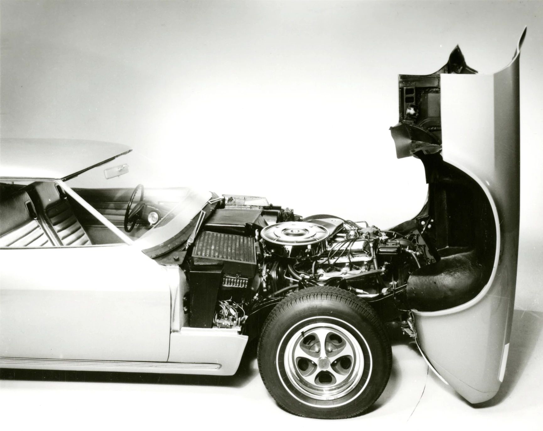 1968 Ford Techna Concept Car: Retro-Future Anachronism With A Weird Offset Driveshaft And Power Doors 20 B&W photo of the front end of the Ford Techna concept car tilted up for service access