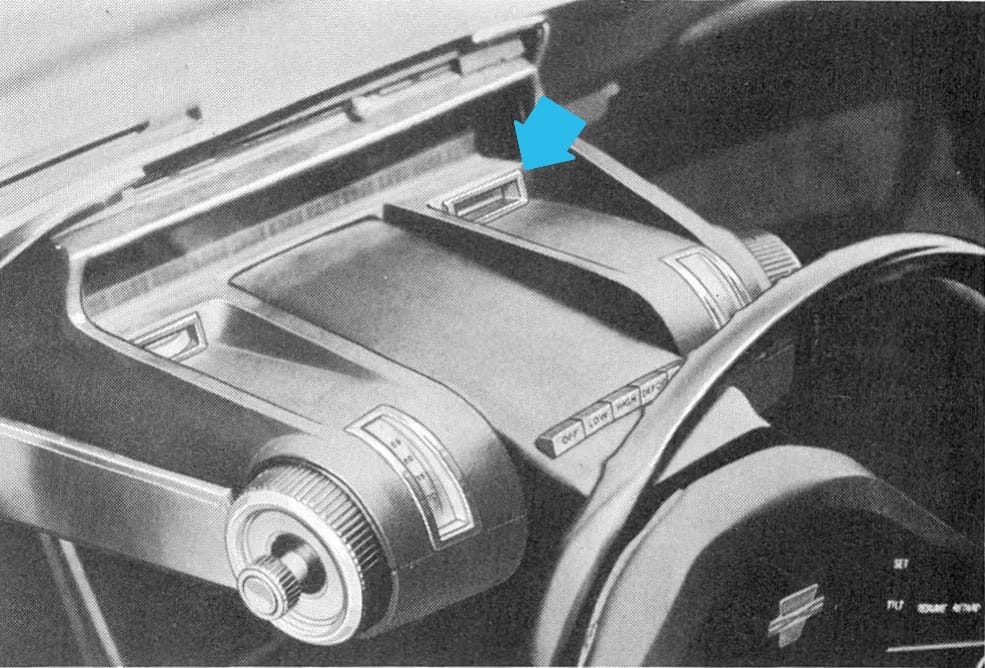 1968 Ford Techna Concept Car: Retro-Future Anachronism With A Weird Offset Driveshaft And Power Doors 12 B&W photo of the top of the steering column of the Ford Techna, with an arrow indicating the warning display window