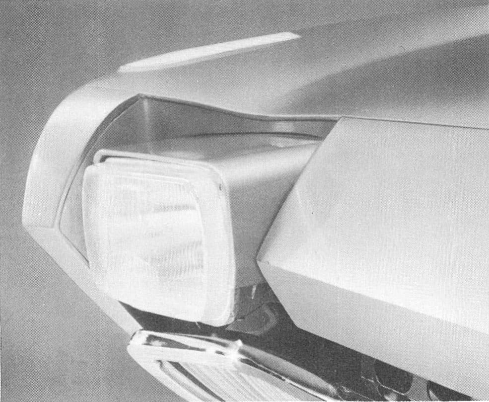 1968 Ford Techna Concept Car: Retro-Future Anachronism With A Weird Offset Driveshaft And Power Doors 21 B&W photo of the Ford Techna concept car's retractable headlight in the raised position