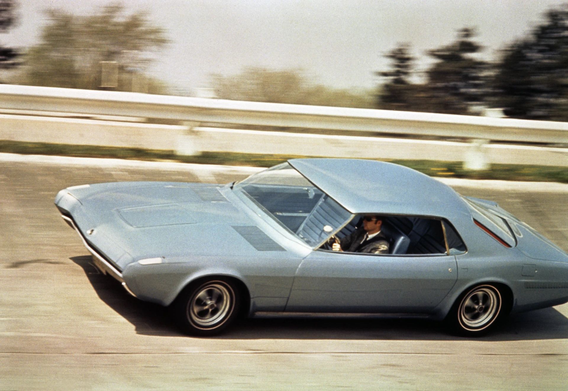1968 Ford Techna Concept Car: Retro-Future Anachronism With A Weird Offset Driveshaft And Power Doors 1 Vintage color photo of the 1968 Ford Techna concept car on a proving grounds oval track