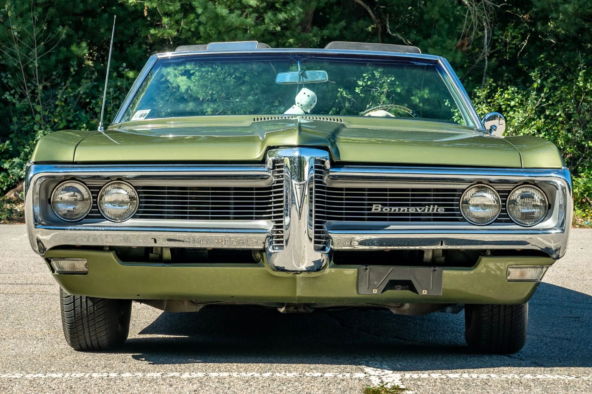 Front view of a green 1968 Pontiac Bonneville convertible