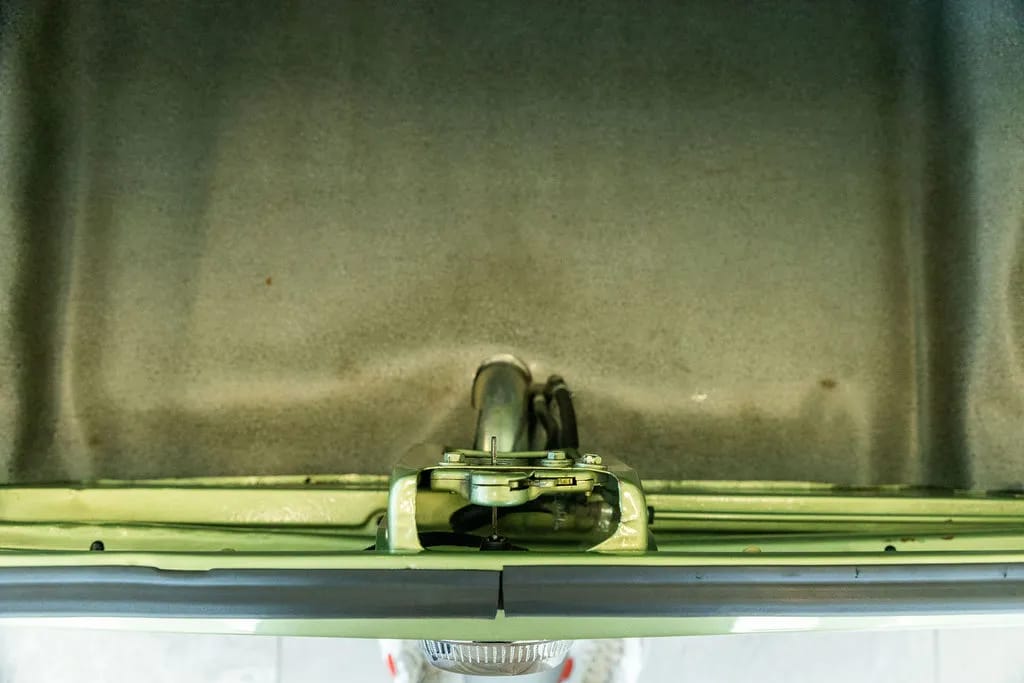 Trunk and fuel filler of a green 1969 Ford Torino