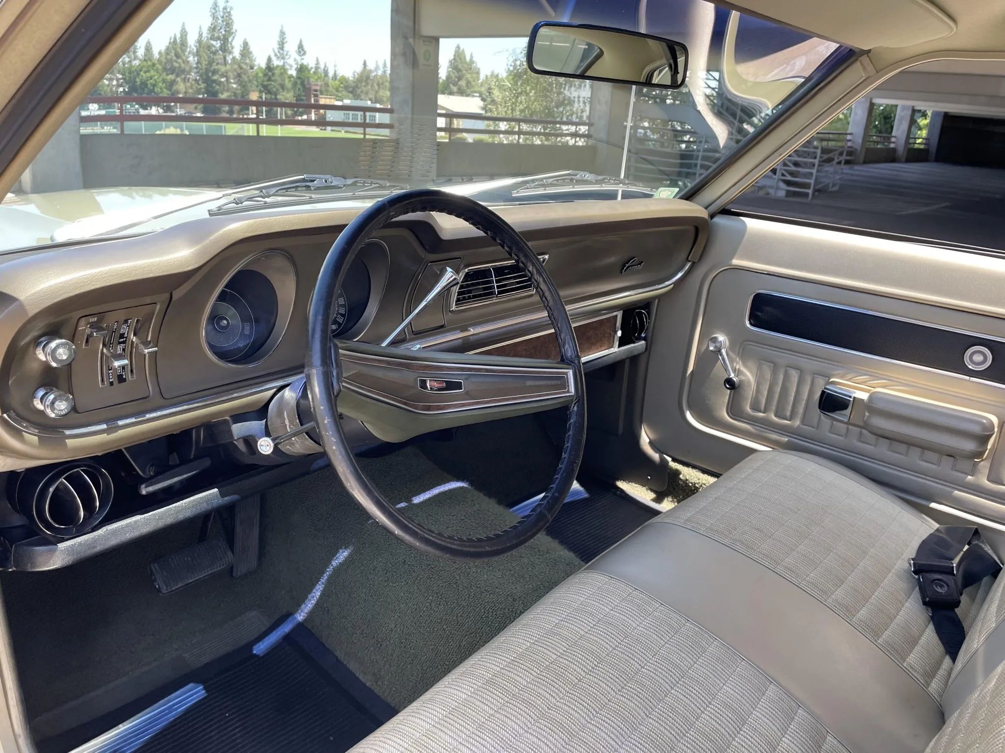 Dashboard and front seat of a 1971 Mercury Comet two-door sedan