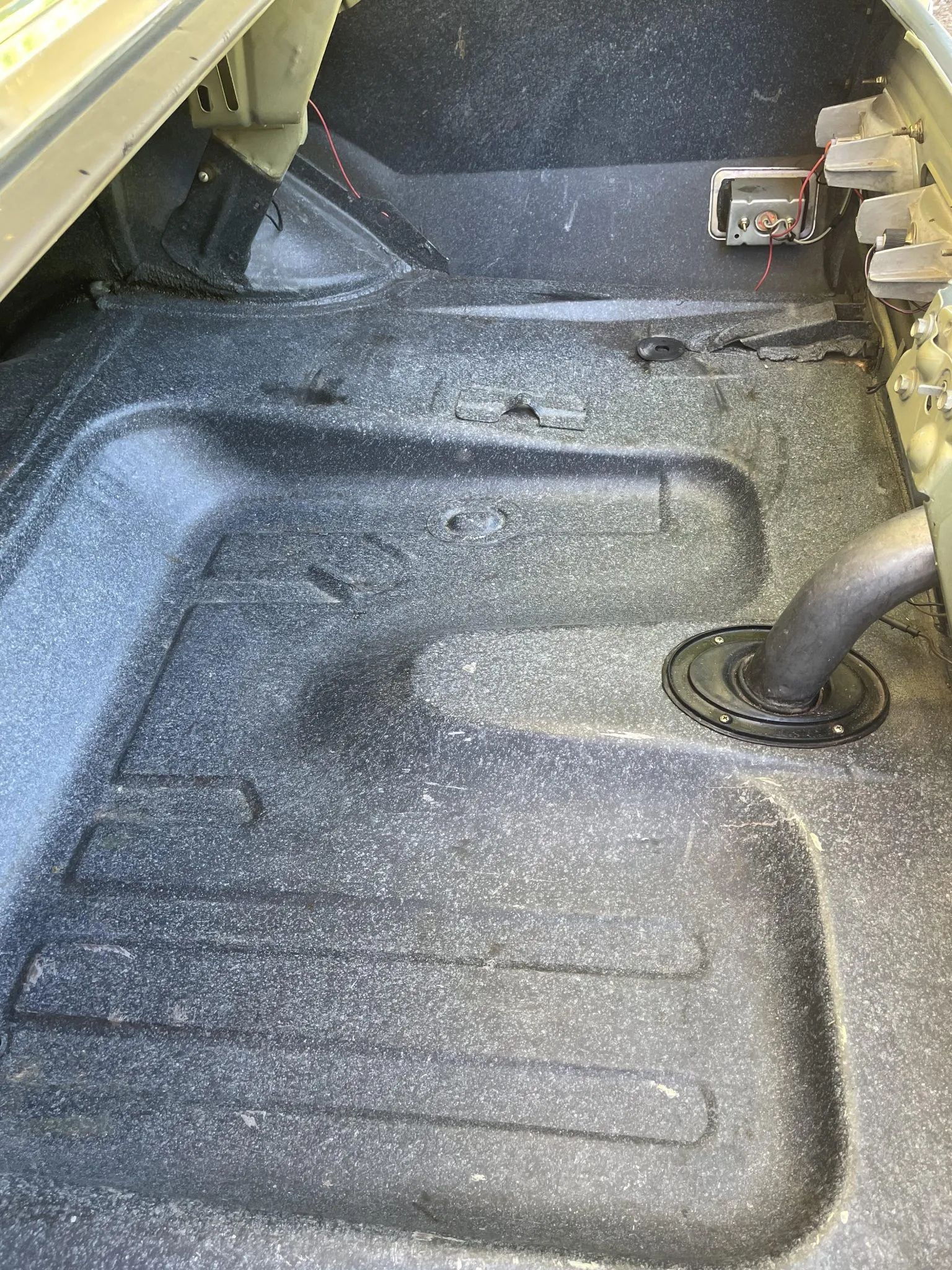 Trunk floor and fuel filler of a 1971 Mercury Comet