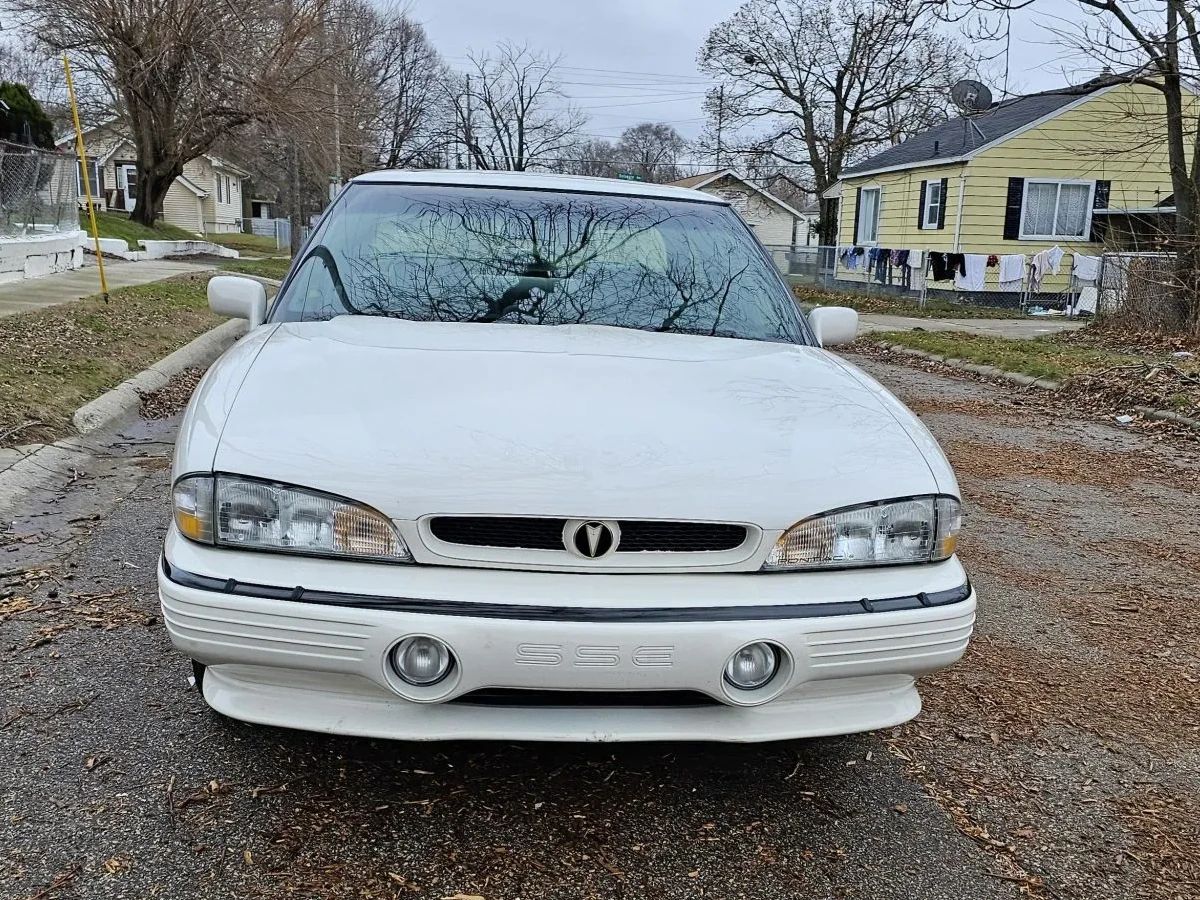 Front view of a white 1992 Pontiac Bonneville sedan