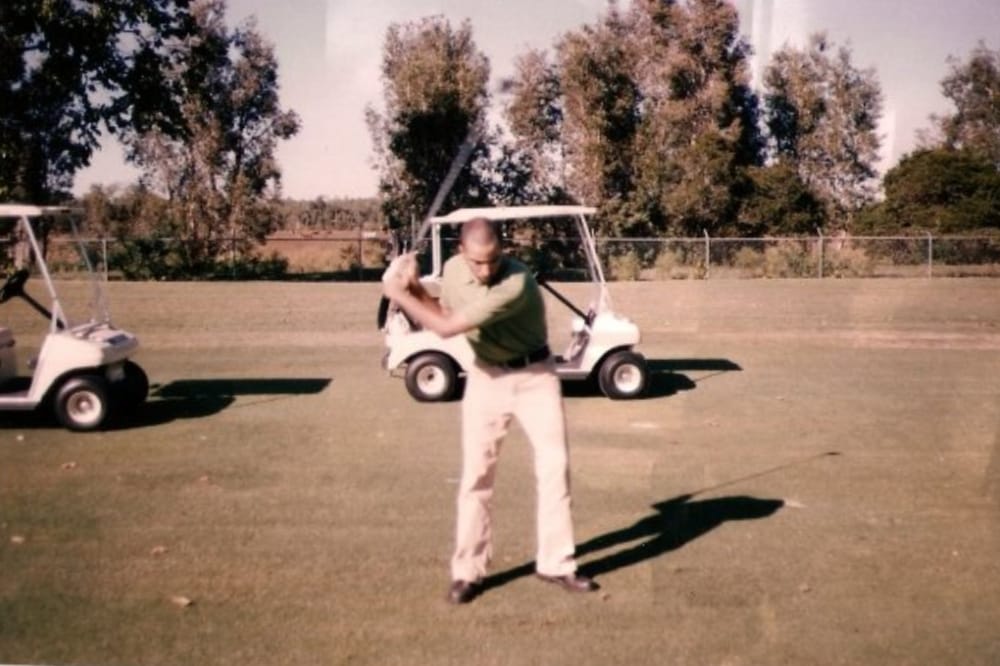 Curbside Musings: 1987 Ford Escort GT – Proper Form 4 Joe Dennis attempting to golf. Sometime in 1996.
