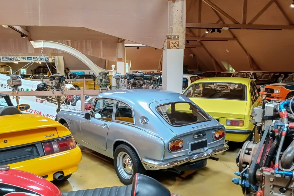 A view of of the Manoir de l’Automobile Museum in Brittany, with a 1960s Honda S800 coupe at center. 