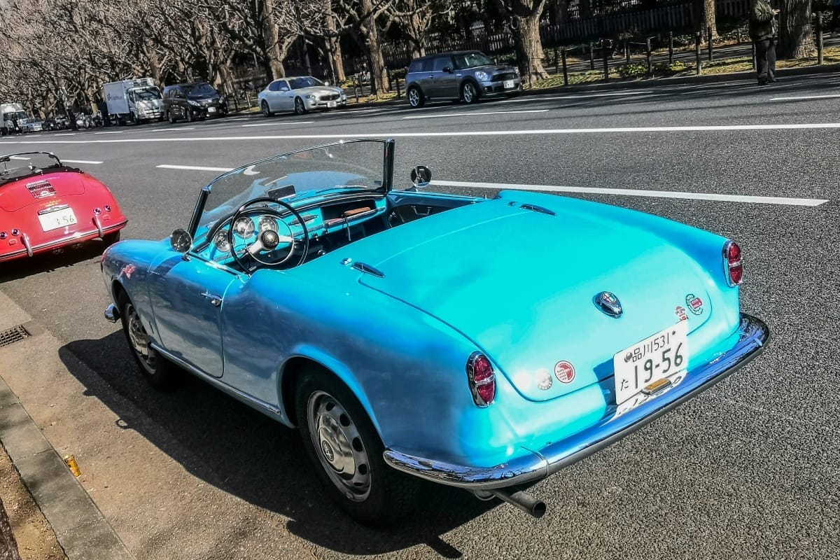 Curbside Find: 1956 Alfa Romeo Giulietta Spider: Blue Sky Thinking 1 Photo of the rear end of a blue 1956 Alfa Romeo Giulietta Spider with a Japanese license plate, parked on the left side of a Japanese street