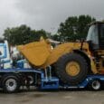 A semi-low loader with wheel wells is ideal for transporting heavy, tall, and wheeled machinery. The picture says it all, the Caterpillar 980 is sitting low and utterly secure, while [&hellip;]