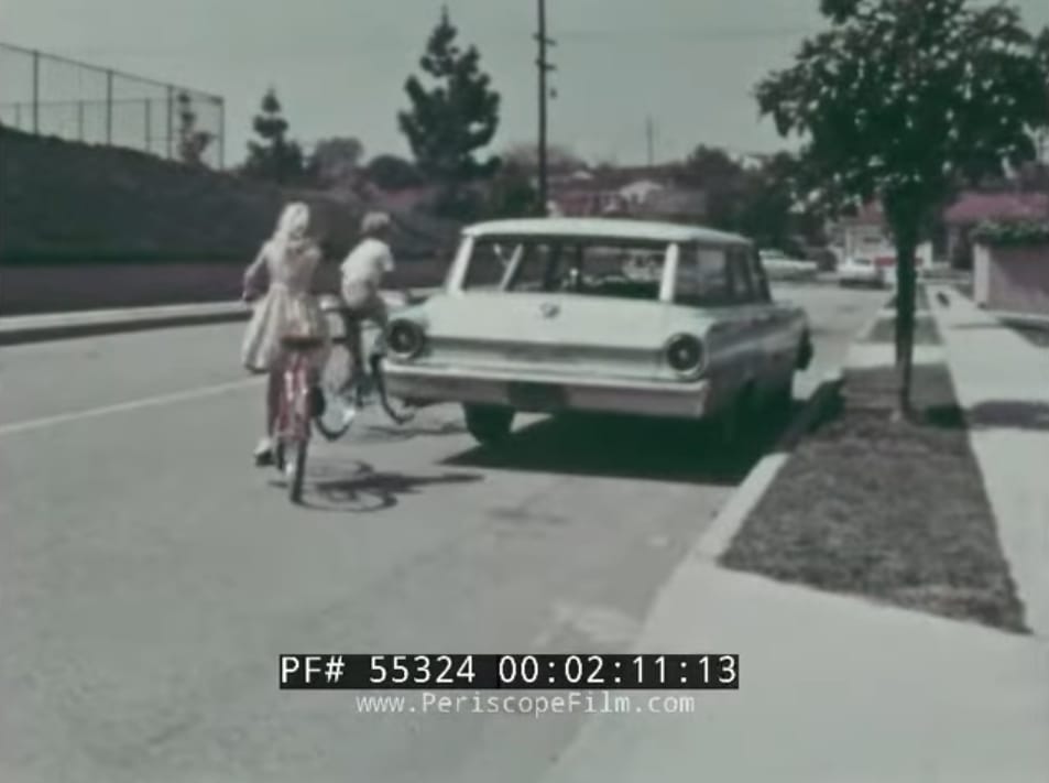 Old Bikes, Old Cars: Cars from A Bicycle Safety Film – Bicycle Rules Of The Road 7 Image of kids on bikes with 1961 Ford station wagon