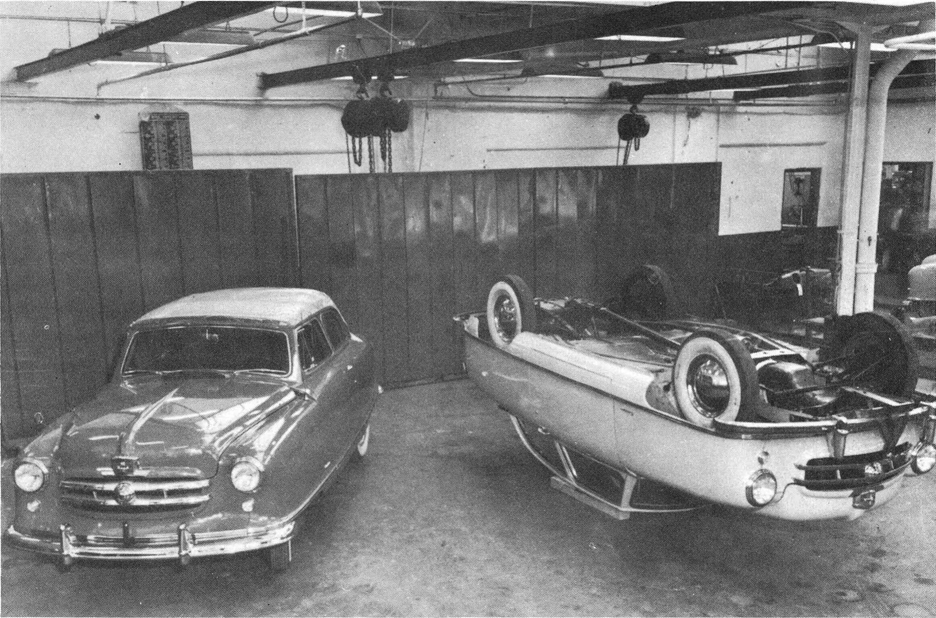 "Don't Try This With A Conventional Convertible" 1 B&W photo of two 1950 Nash Rambler convertibles, one of them upside down on a couple of wooden boards