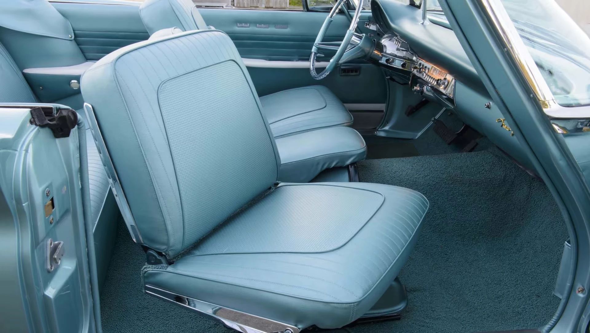 Swiveling bucket seats in the front of a 1960 Chrysler New Yorker convertible