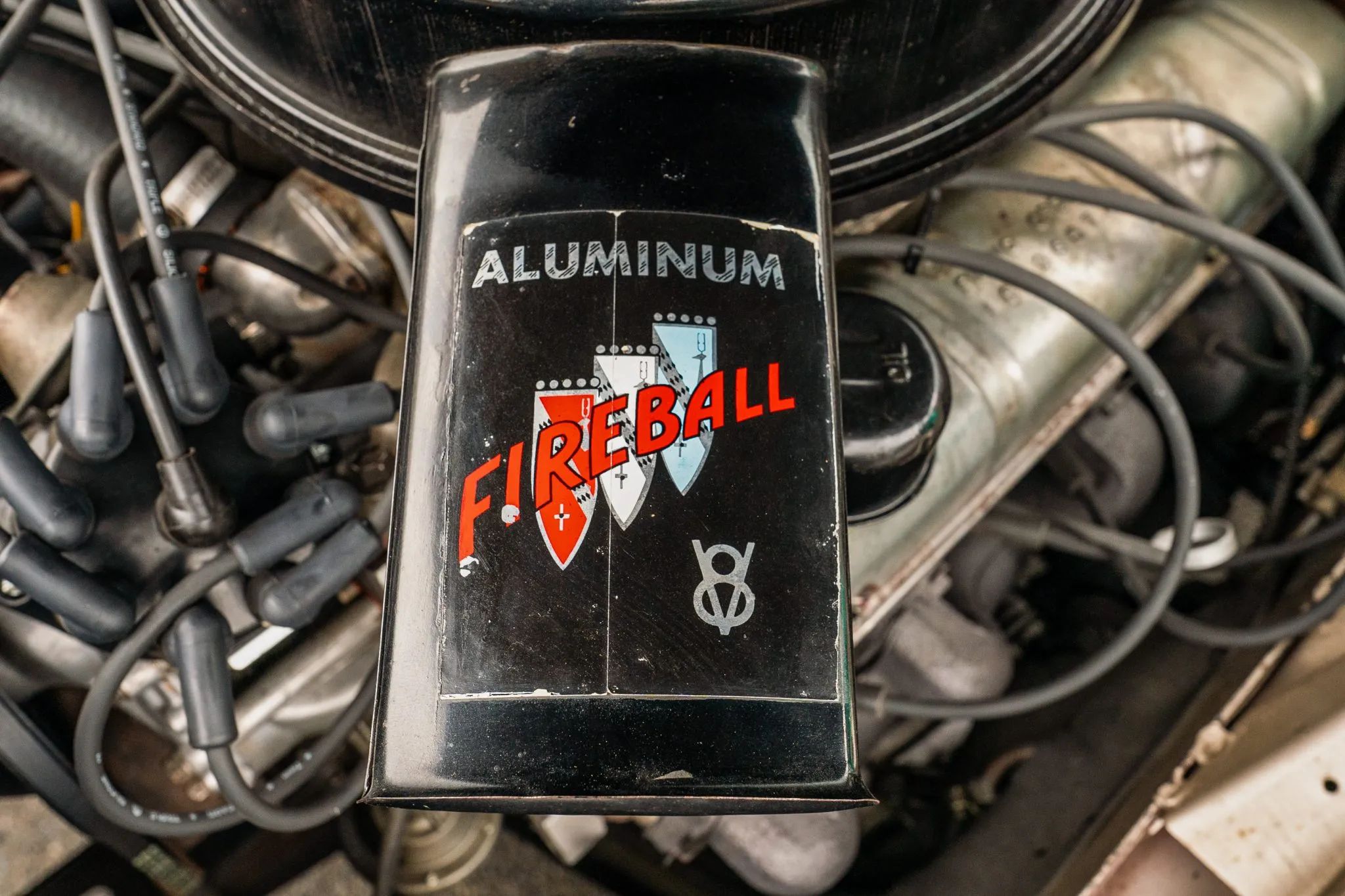 1961 Buick Special Wagon: Rare Three-Pedal Station Wagon With Aluminum V-8 And 3-Speed Stick 10 Air cleaner intake tube of a 1961 Buick engine with a decal reading "Aluminum Fireball V8"