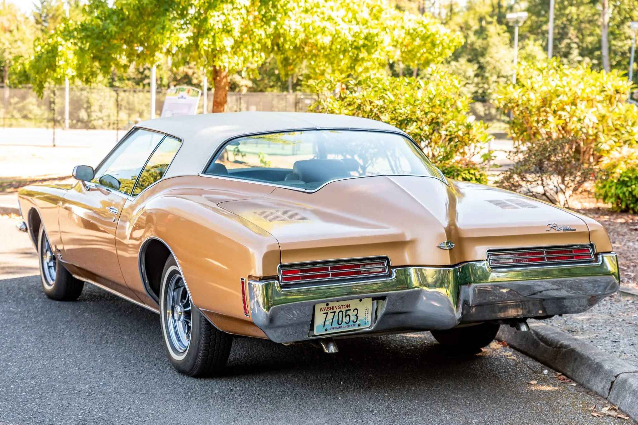 1973 Buick Riviera GS Stage 1 With Rare MaxTrac Traction Control: No Fishtailing In Your Boattail 4 Left rear 3q view of an orange 1971 Buick Riviera