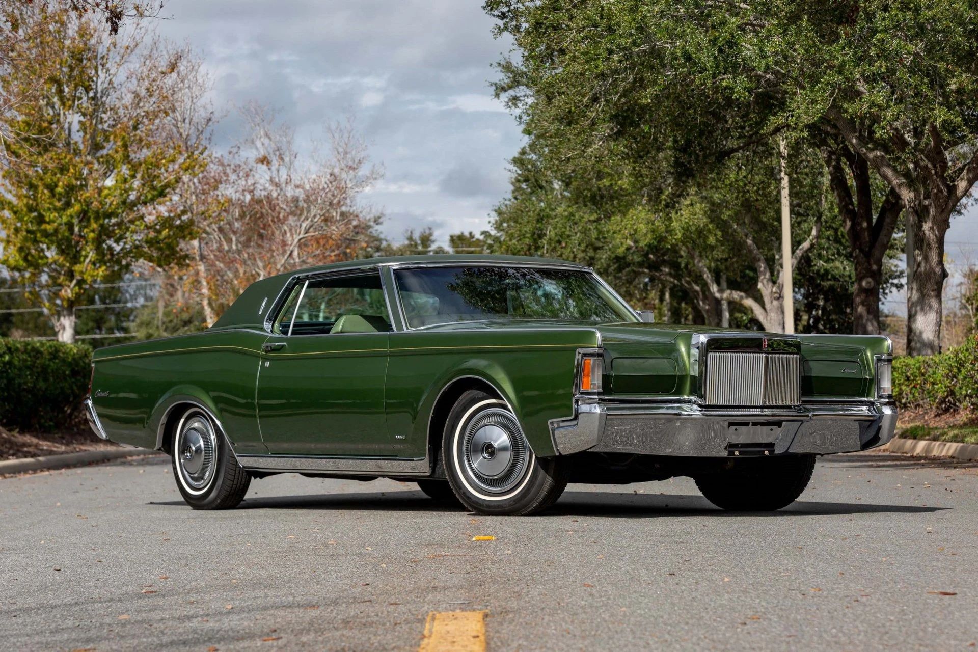 Right front 3q view of a metallic green 1971 Mark III
