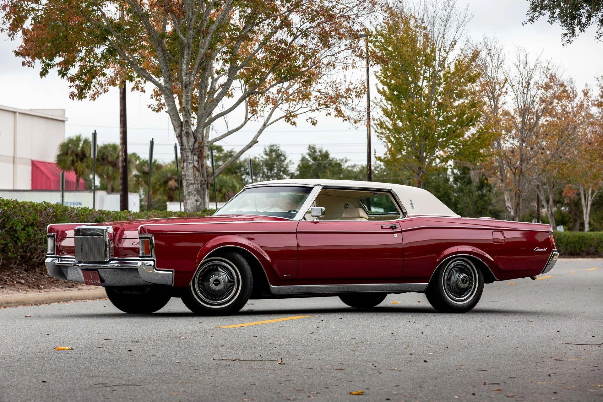Left front 3q view of a metallic red 1971 Lincoln Mark III