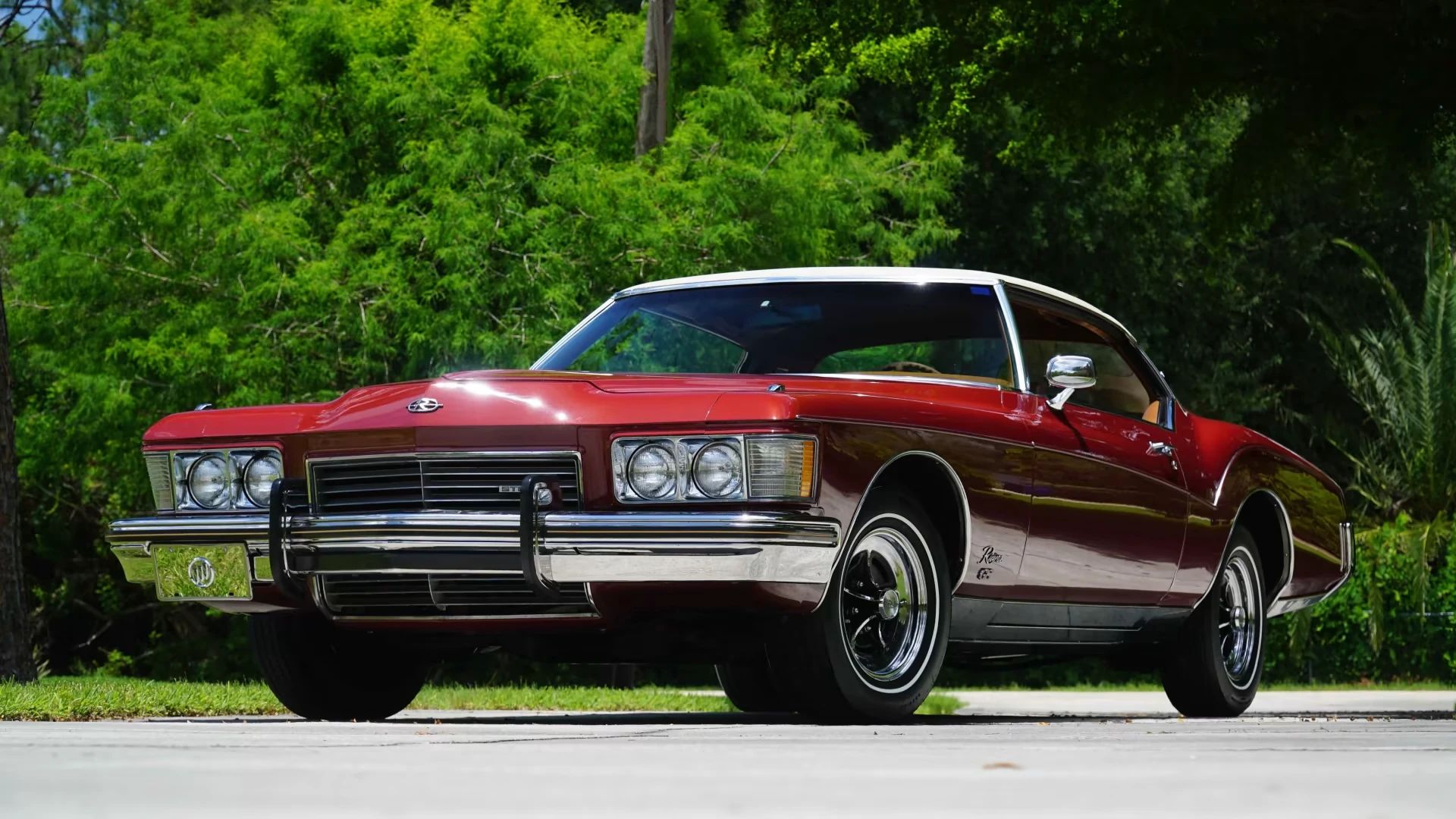 1973 Buick Riviera GS Stage 1 With Rare MaxTrac Traction Control: No Fishtailing In Your Boattail 7 Low-angle front 3q view of a red 1973 Buick Riviera