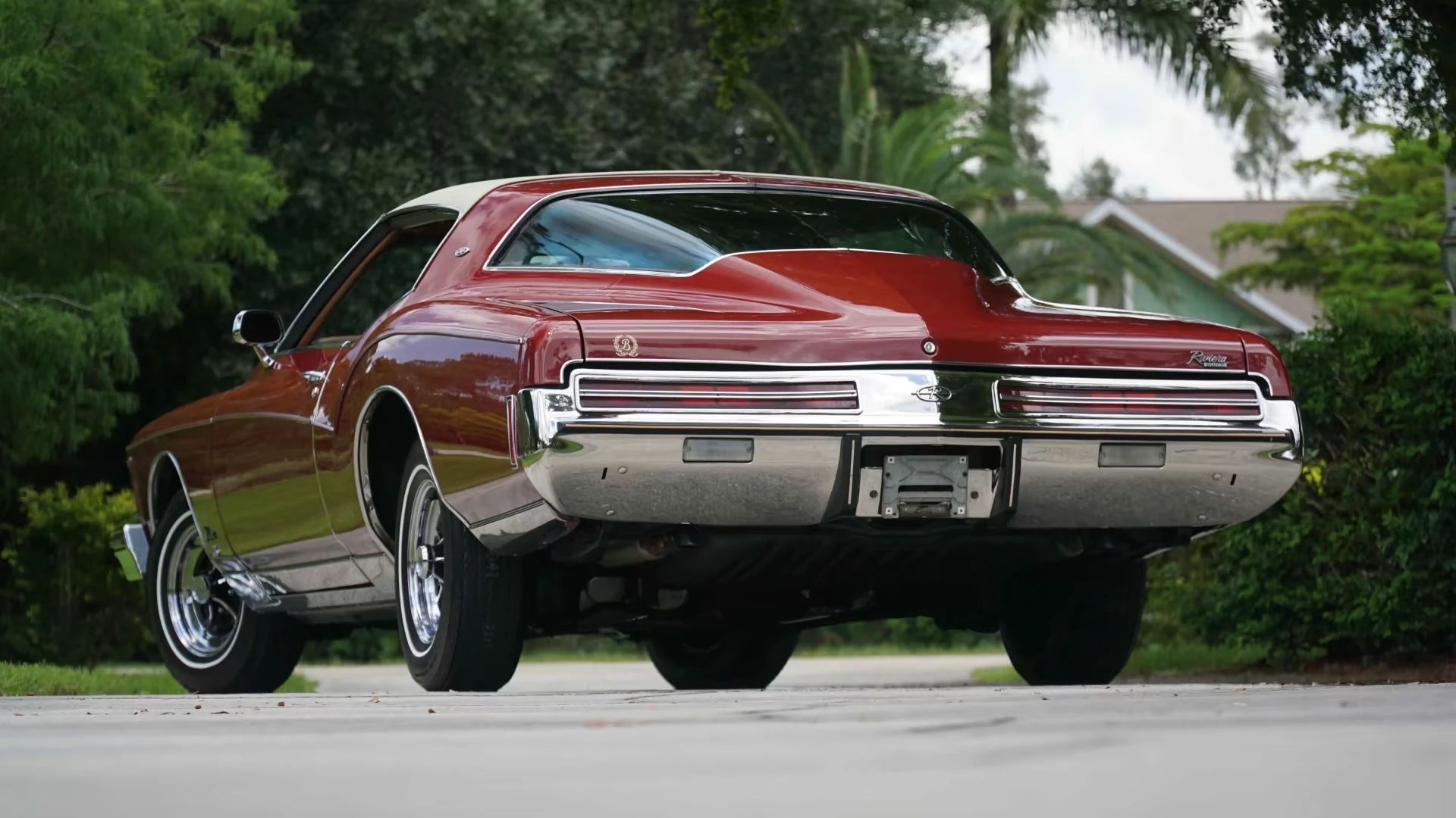 1973 Buick Riviera GS Stage 1 With Rare MaxTrac Traction Control: No Fishtailing In Your Boattail 21 Low-angle rear 3q view of a red 1973 Buick Riviera