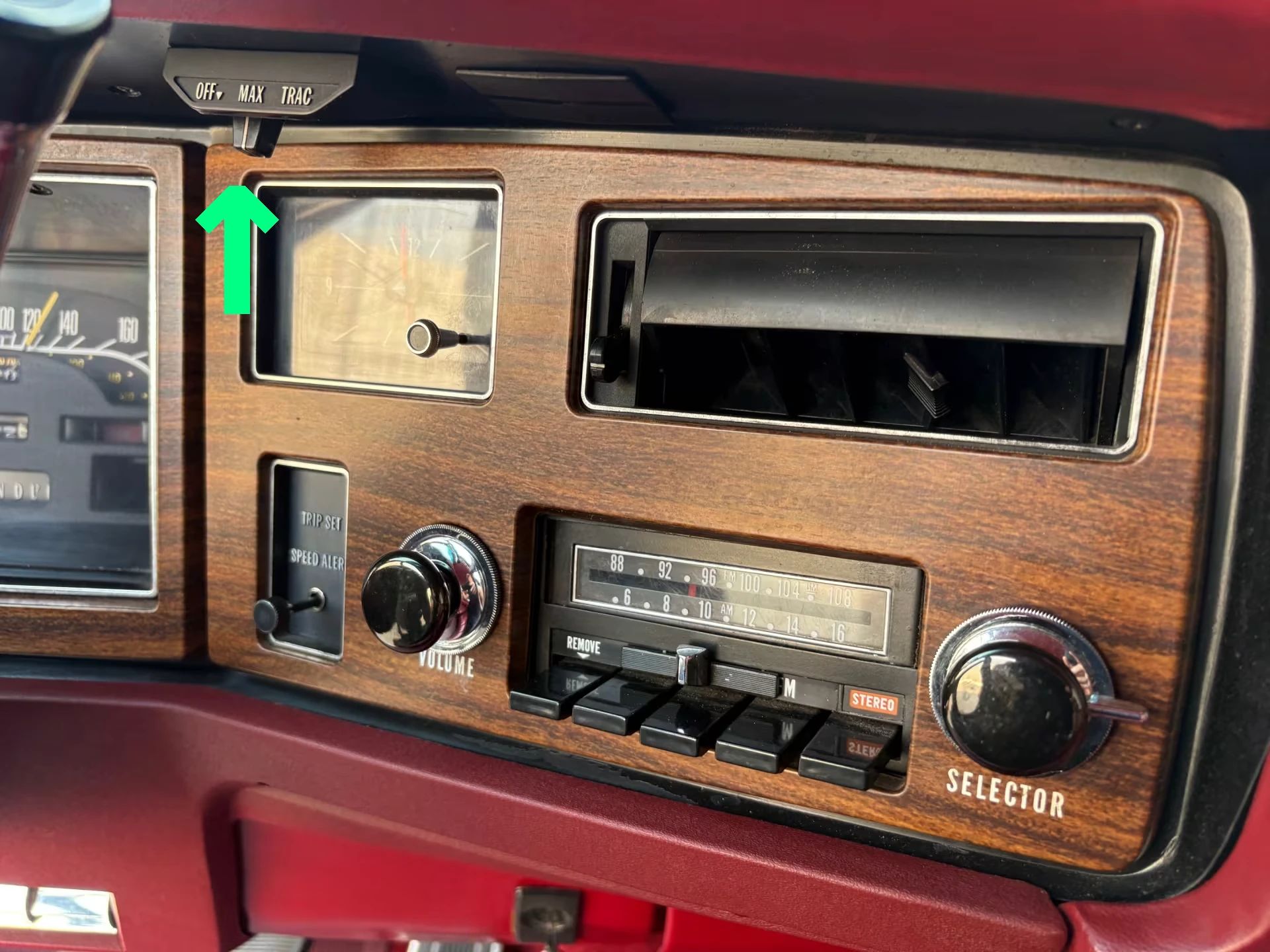 1973 Buick Riviera GS Stage 1 With Rare MaxTrac Traction Control: No Fishtailing In Your Boattail 11 Dashboard of a 1973 Buick Riviera with a green arrow indicating the MaxTrac control switch