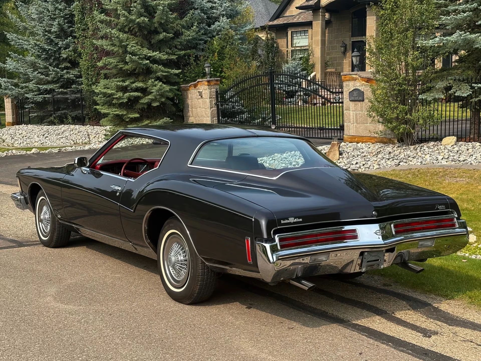 1973 Buick Riviera GS Stage 1 With Rare MaxTrac Traction Control: No Fishtailing In Your Boattail 1 Left rear 3q view of a Midnight Gray 1973 Buick Riviera GS