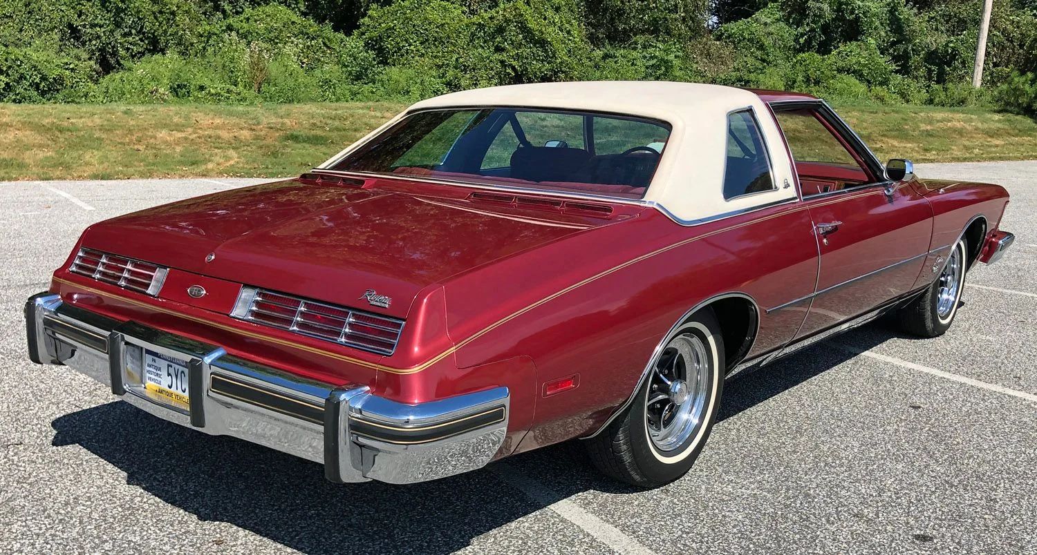 1973 Buick Riviera GS Stage 1 With Rare MaxTrac Traction Control: No Fishtailing In Your Boattail 19 Right rear 3q view of a red 1974 Buick Riviera