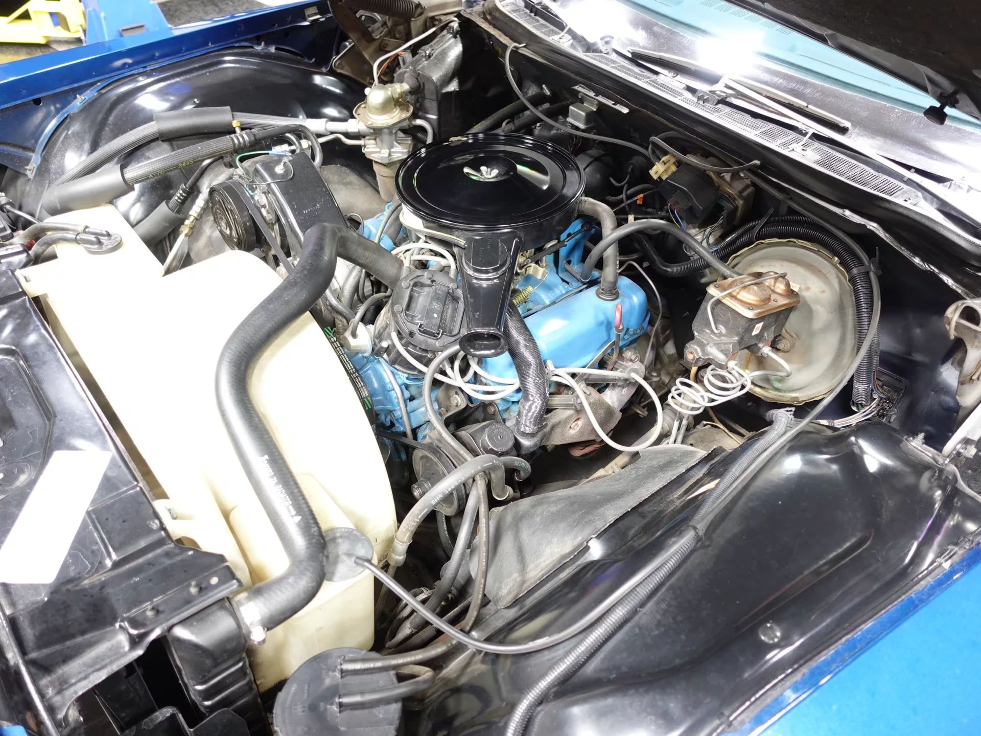 1976 Buick LeSabre V-6: Why Did Buick Build This Rare, Slow, Massively Underpowered Big Car? 5 Buick V-6 engine under the hood of a blue 1976 LeSabre