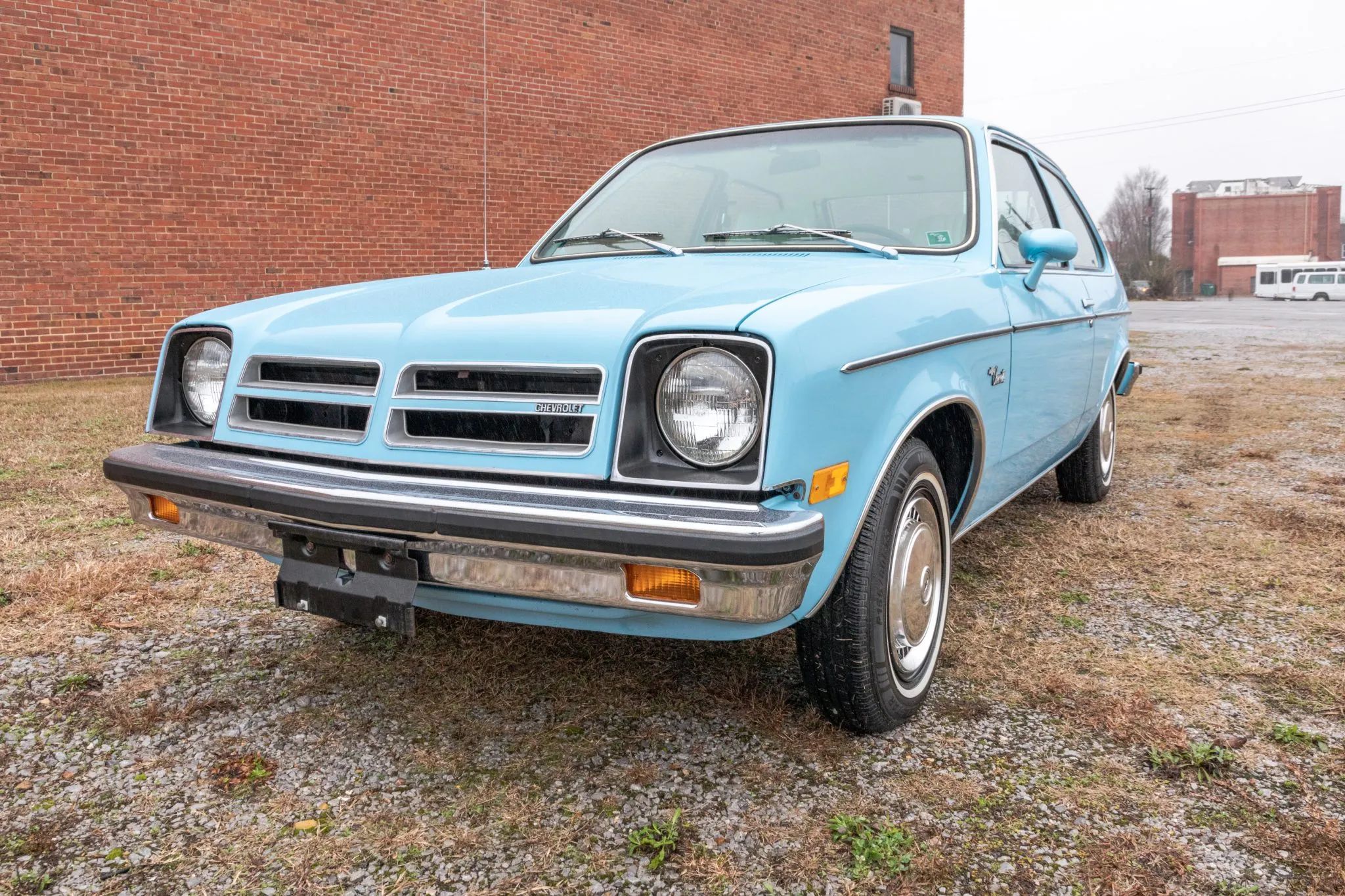 Left front 3q view of a blue 1977 Chevrolet Chevette hatchback