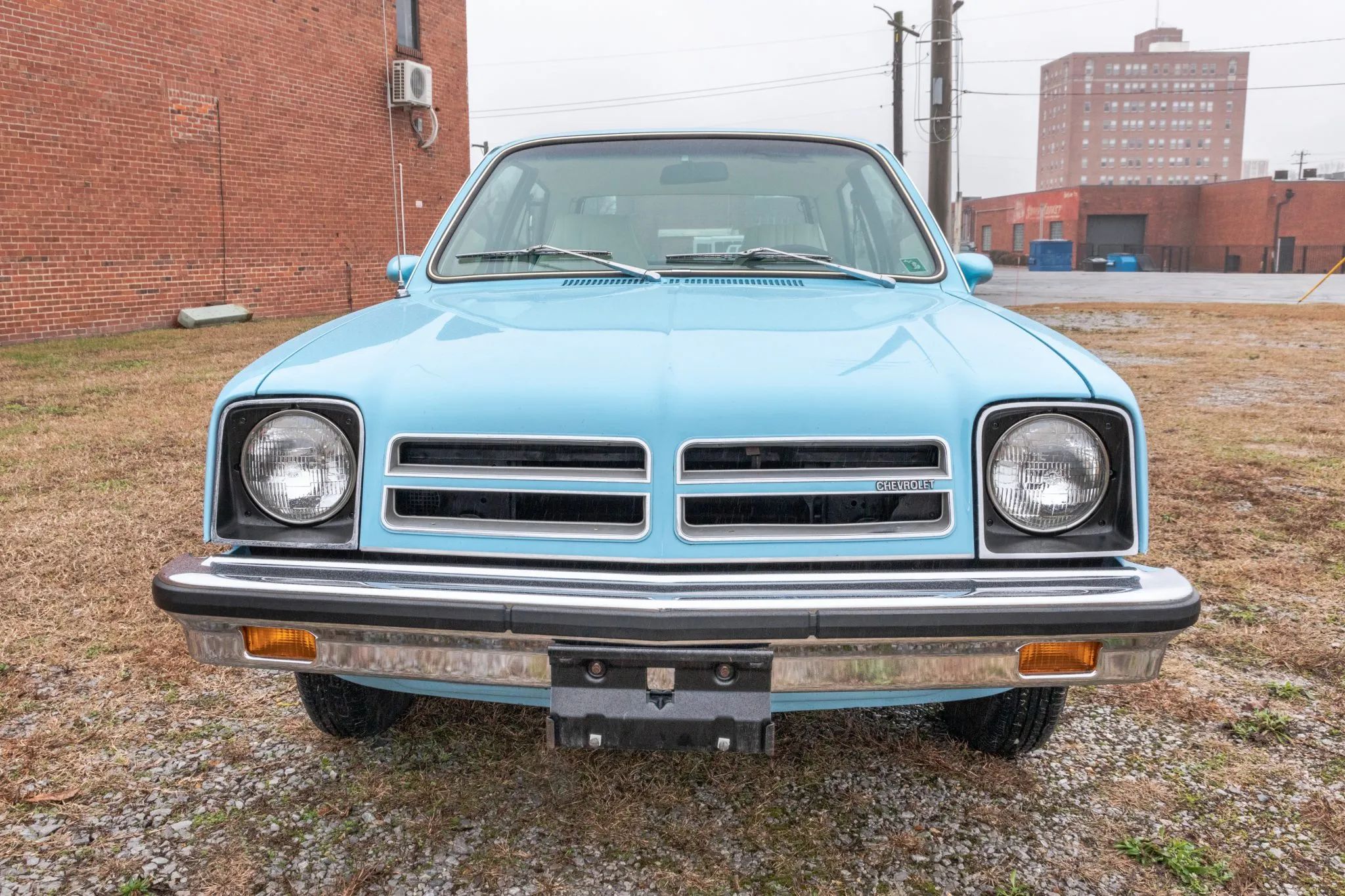 Front view of a blue 1977 Chevrolet Chevette