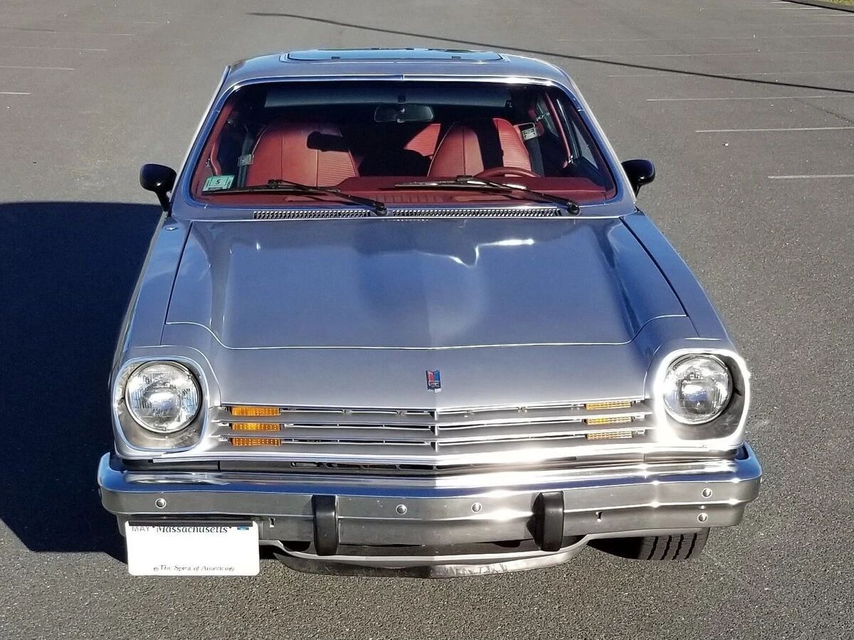High-angle front view of a silver 1977 Chevrolet Vega