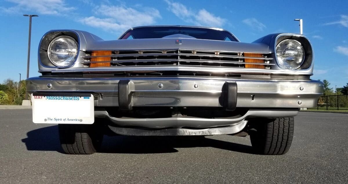Low-angle front view of a silver 1977 Chevrolet Vega