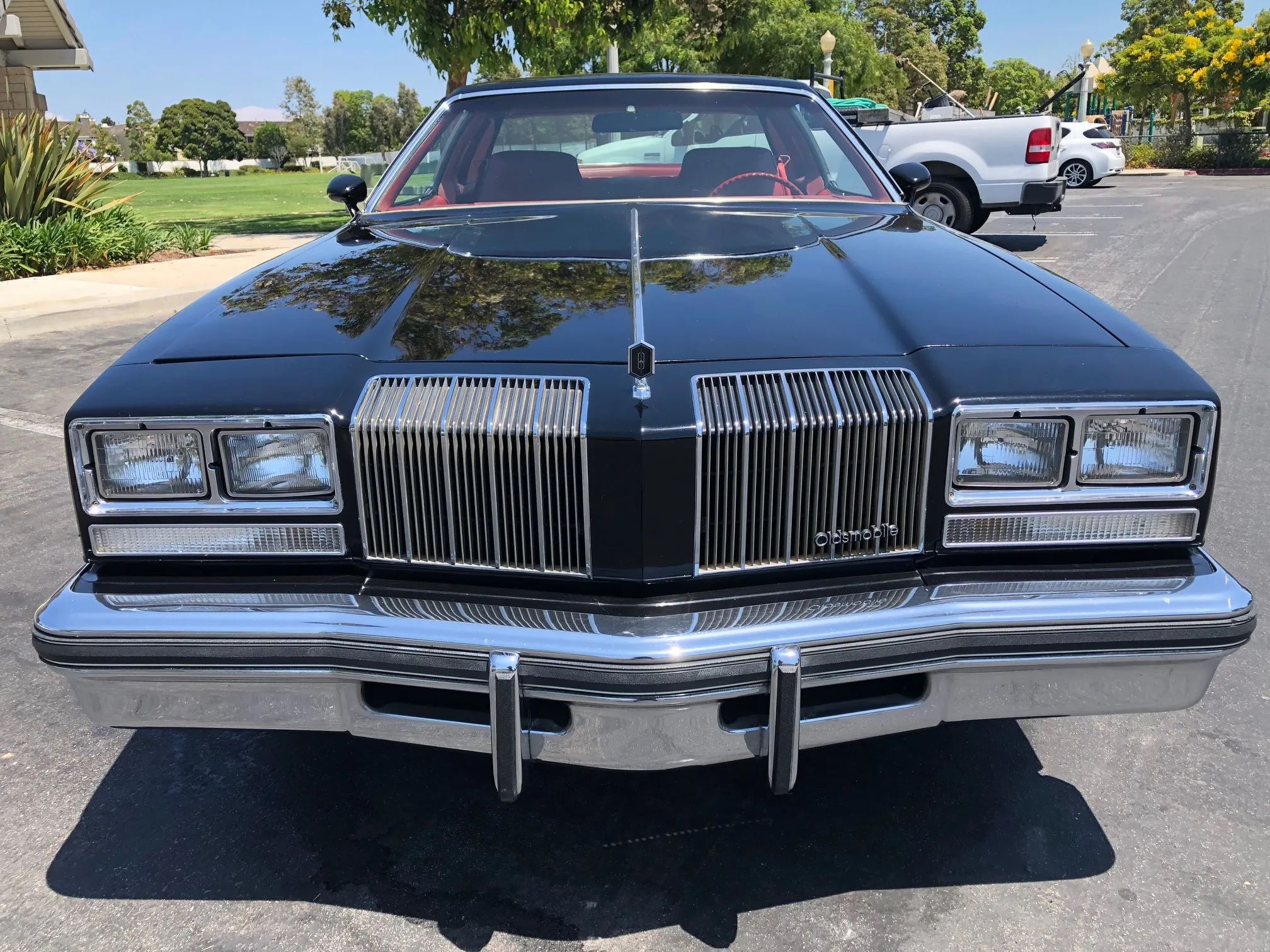 Front view of a black 1977 Oldsmobile Cutlass Supreme