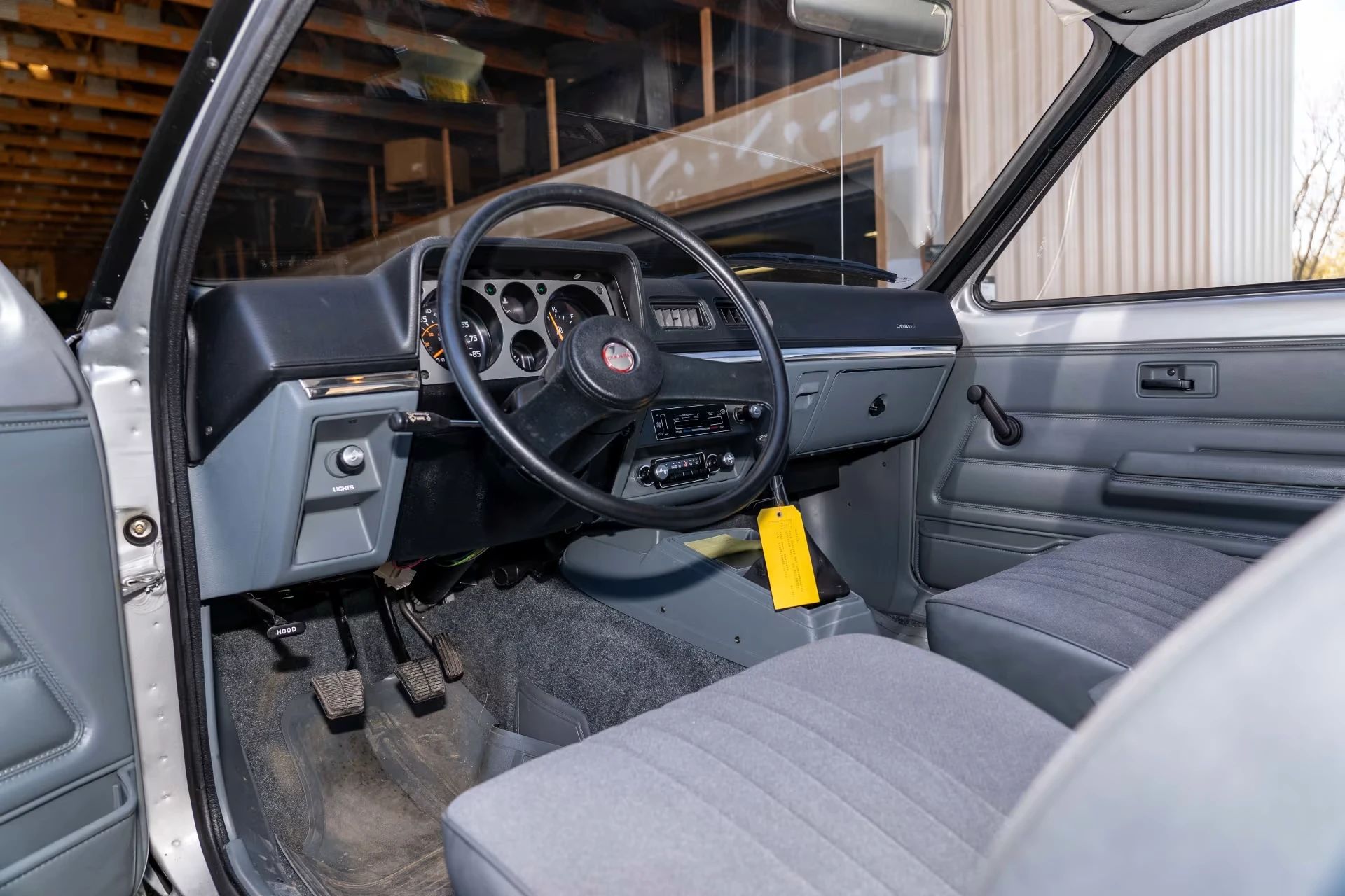 Front seat and dashboard of a 1987 Chevrolet Chevette