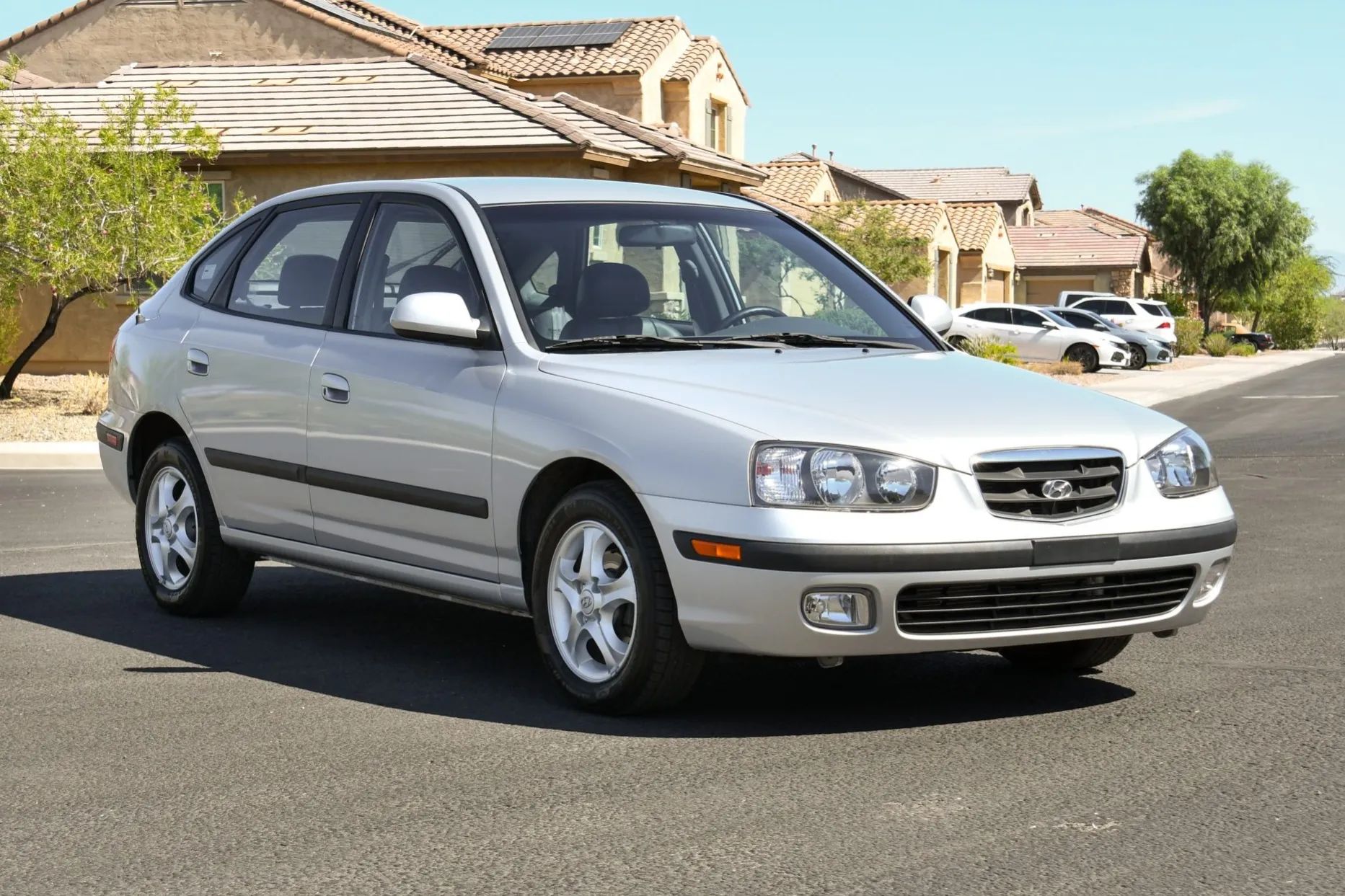 Photo of a silver 2003 Hyundai Elantra hatchback