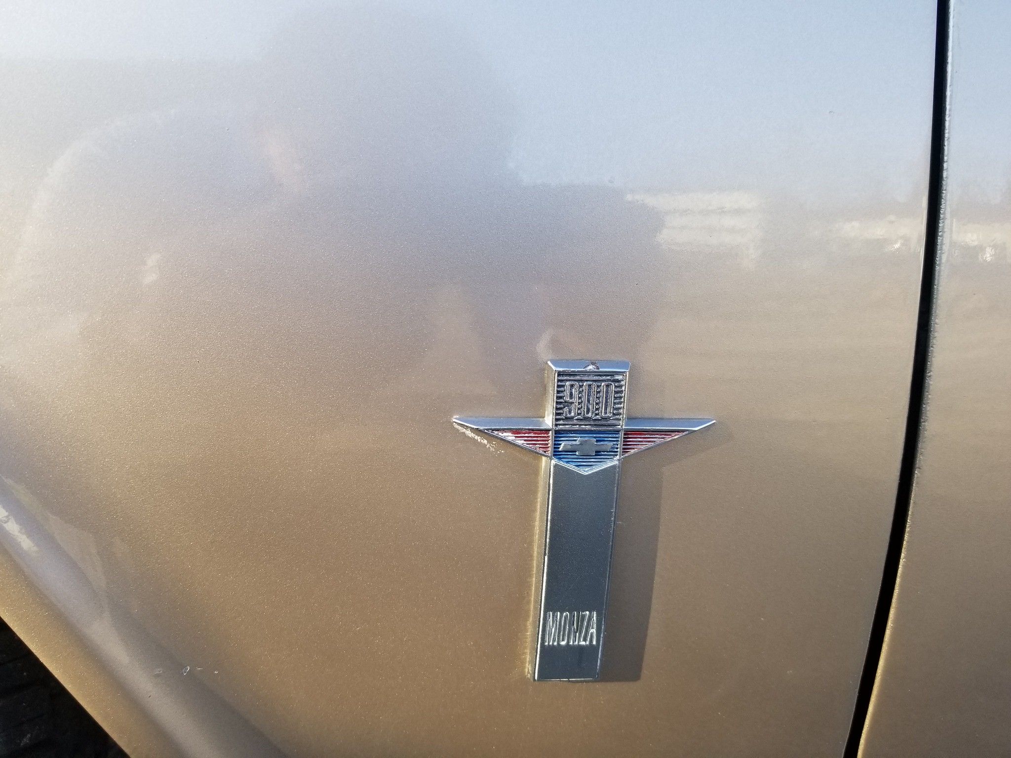 1961 Chevrolet Corvair 900 Monza Sedan: Finding The Magic Formula For Success 2 Picture of fender emblem from 1961 Chevrolet Corvair in Fawn Beige