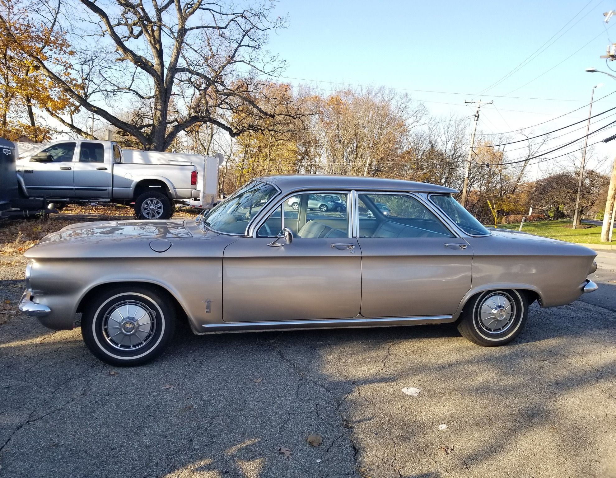 1961 Chevrolet Corvair 900 Monza Sedan: Finding The Magic Formula For Success 1 Image of 1961 Chevrolet Corvair 900 Monza Sedan on a late autumn day parked in the lot of a business