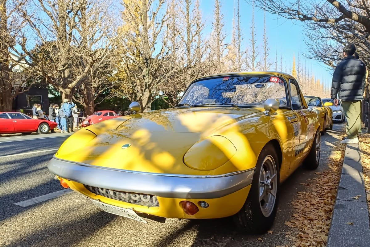T87’s Singles Collection, Autumn 2025 Edition – Part 2: Foreign Cars (British, French & German) 1 A yellow 1960s Lotus Elan parked by the curbside.