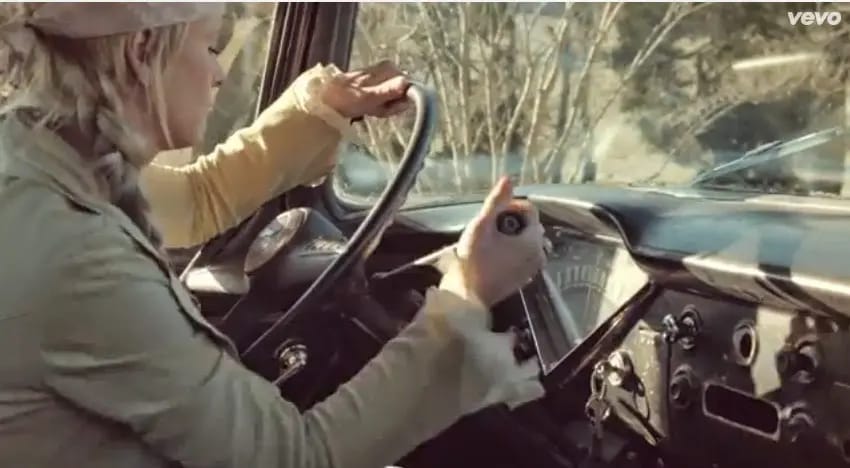 The Last 3-Speed Manual Transmissions With Non-Synchronized First Gear – Grinding Gears Until 1976 1 Video capture of a young blond woman shifting a column-shifted 3-speed transmission