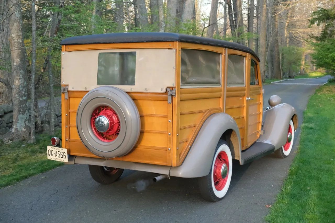 Right rear 3q view of a gray 1935 Ford wood-bodied station wagon