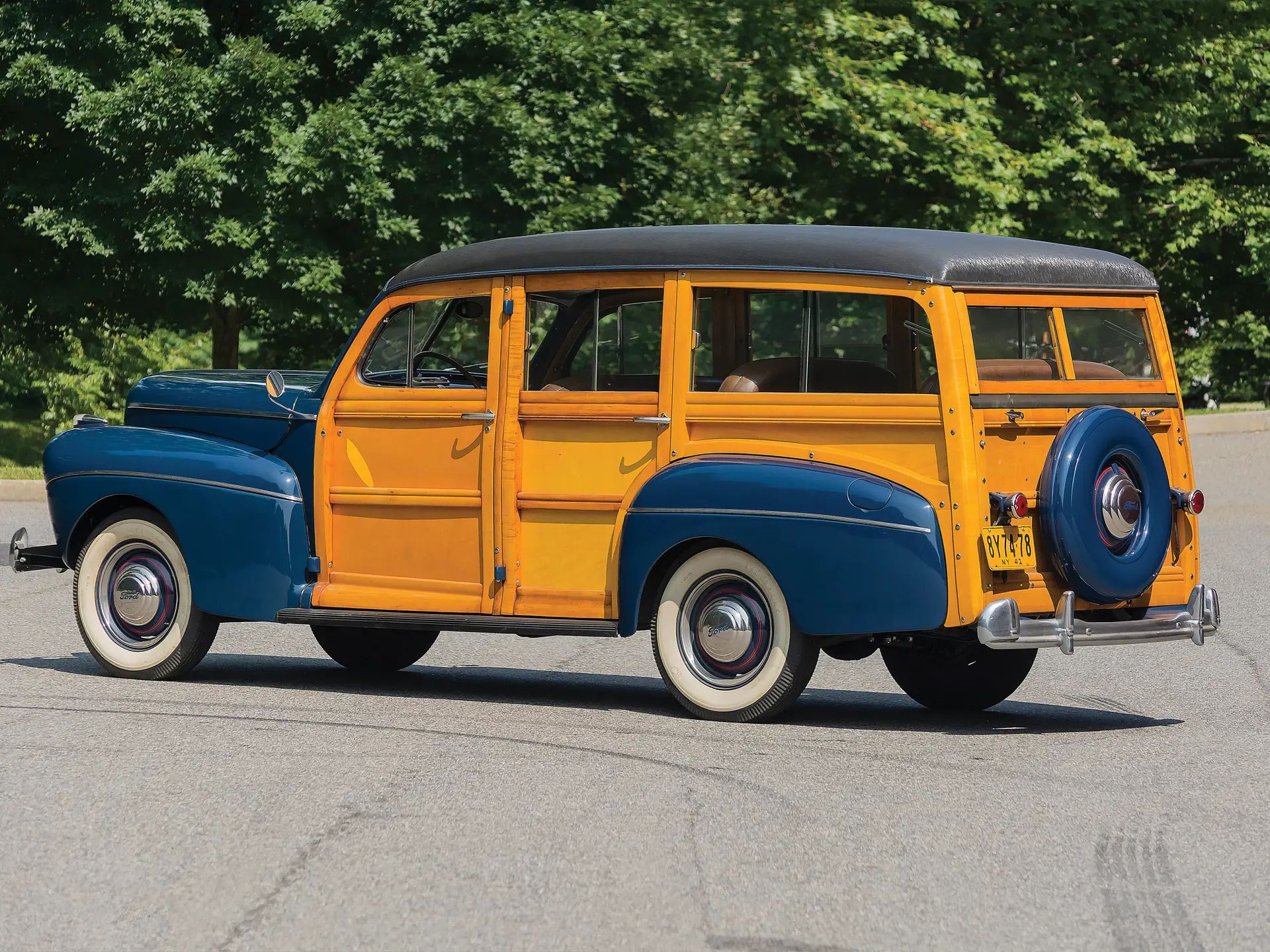 Left rear 3q view of a blue 1941 Ford wood-bodied station wagon