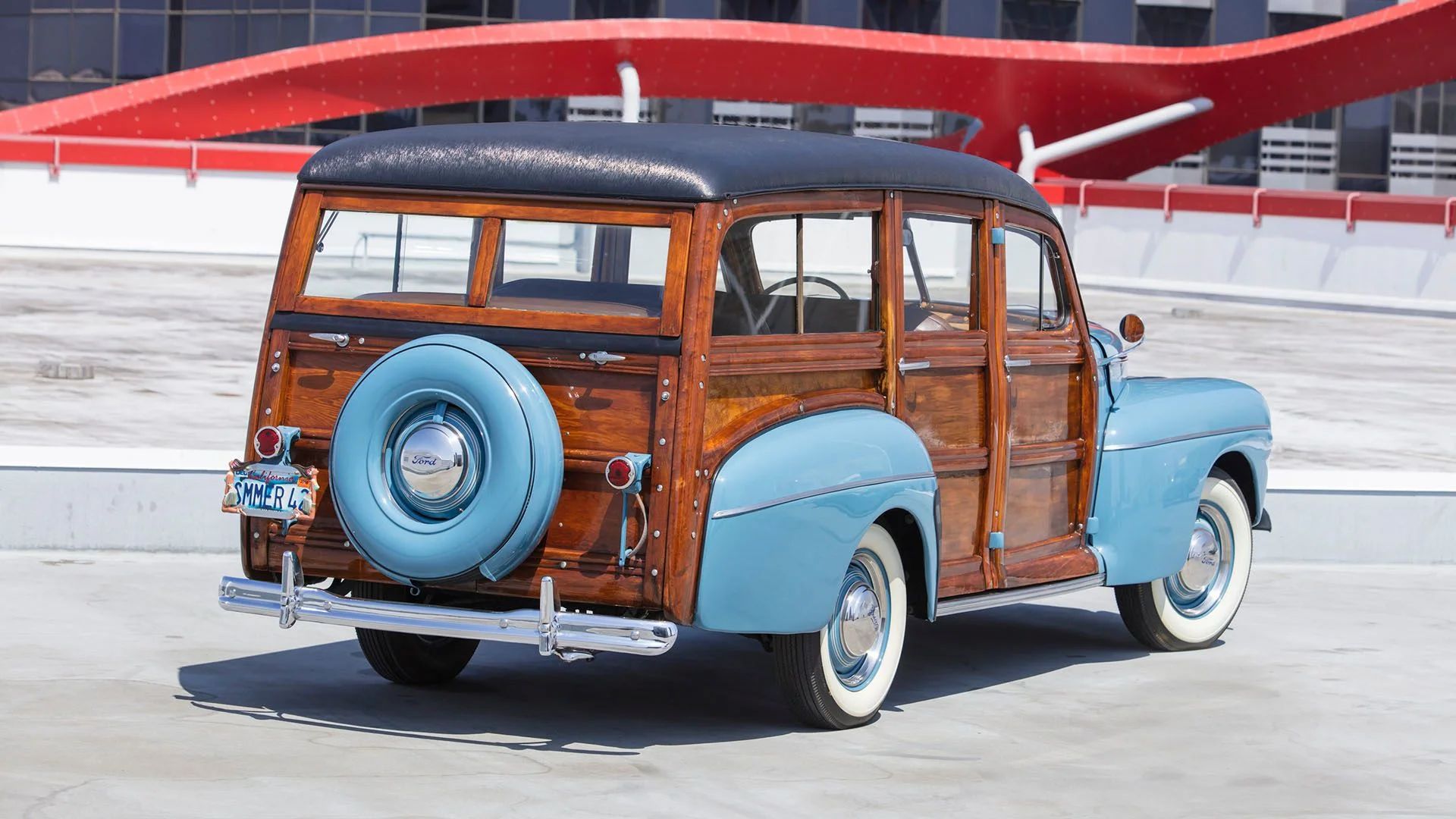 Right rear 3q view of a blue 1942 Ford wood-bodied station wagon